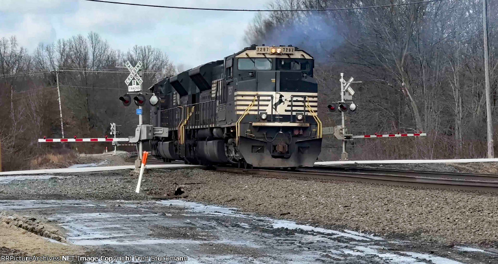 NS 7297 splits the gates and blows some blue smoke.